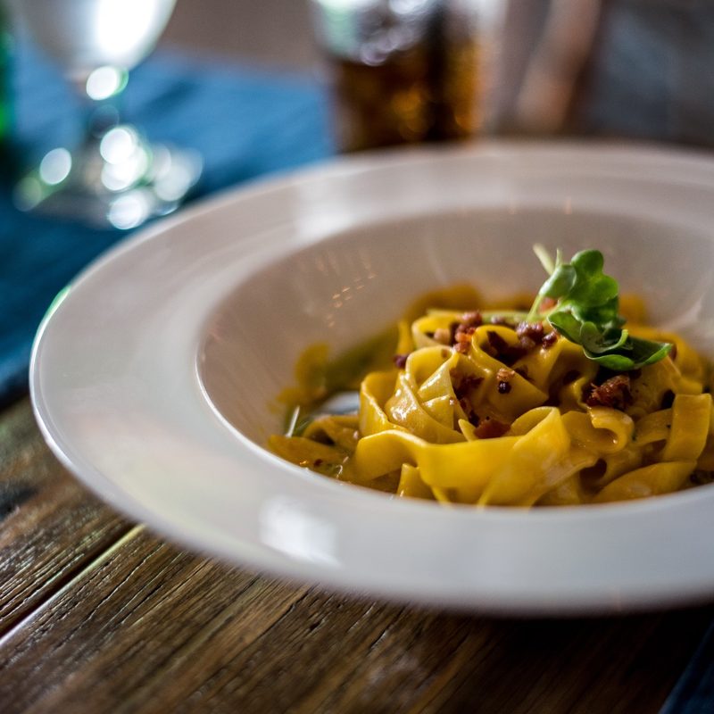 Carbonara in a white bowl