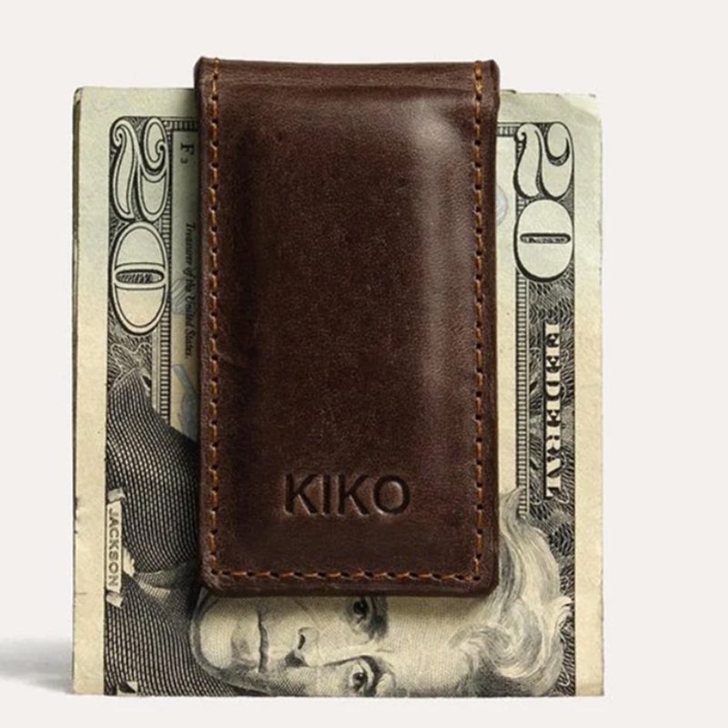A Kiko leather wallet money clip holding a $20 bill.