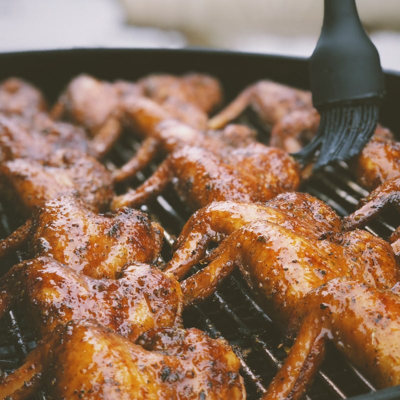 Buffalo wings on a grill