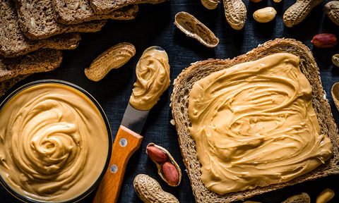 best peanut butter scattered on a slice of bread
