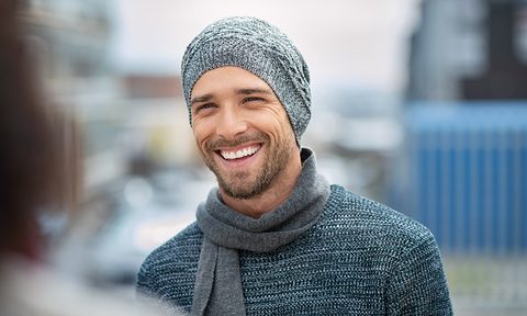 Man in winter sweater and beanie