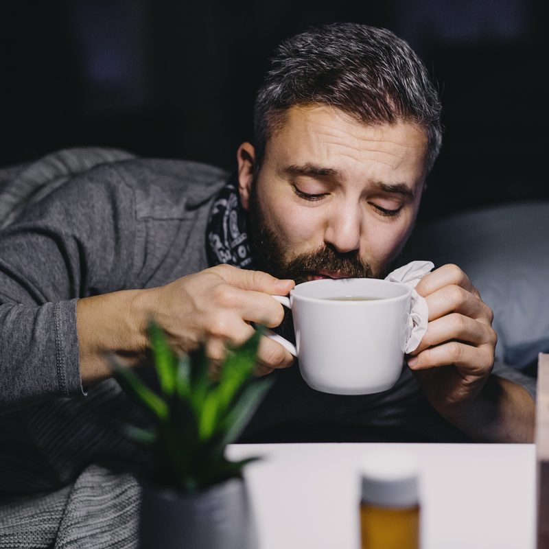 A man sipping some CBD tea
