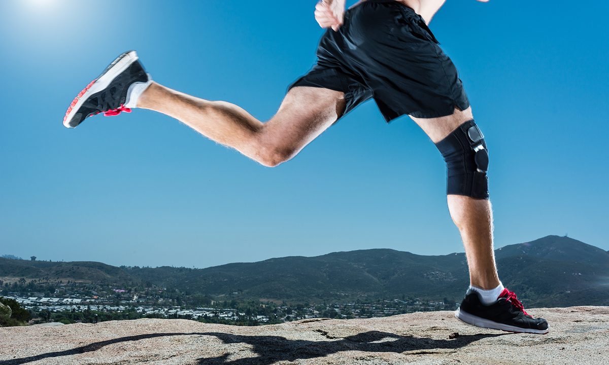 Person running with a knee brace