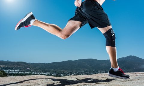 Person running with a knee brace
