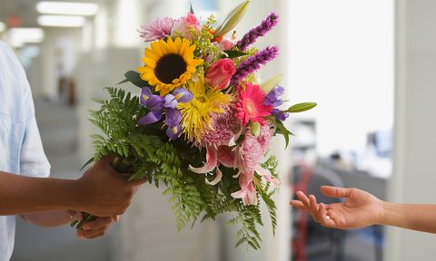 Someone gifting flowers