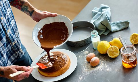 best boxed cake mixes man hands putting icing on freshly baked