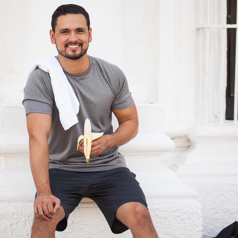 Man holding a banana.