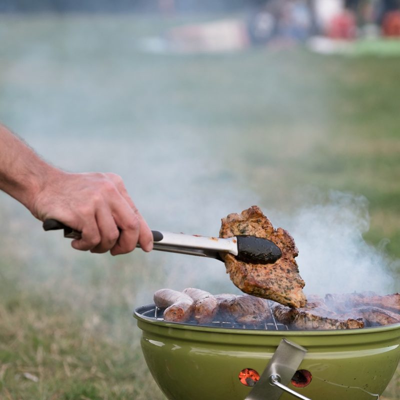 Person smoking meat