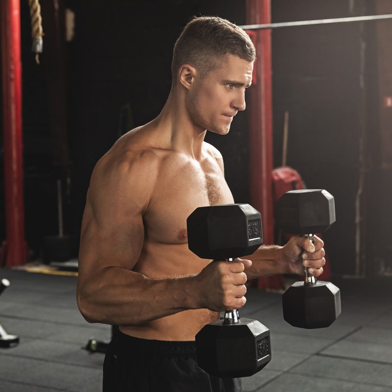 Man doing incline hammer curls.