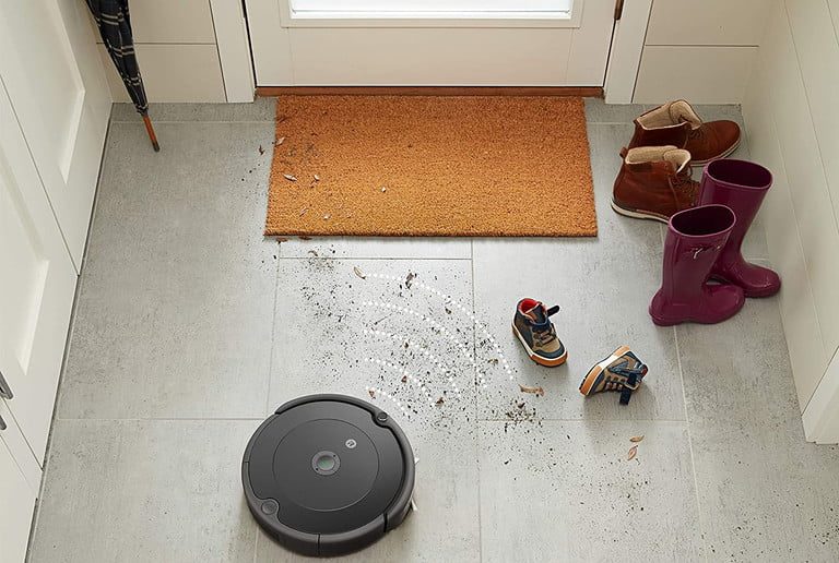 The iRobot Roomba 692 cleaning the floor.