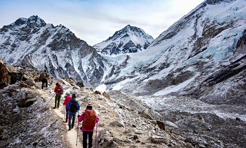 hikers climbing Mount Everest