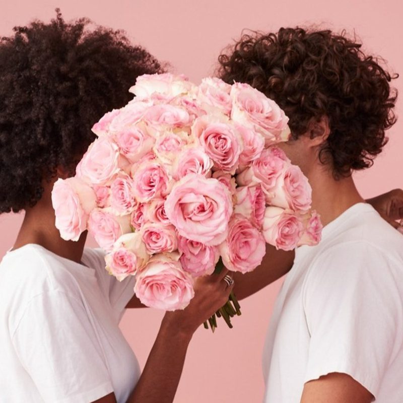Pro Flowers roses with couple kissing.