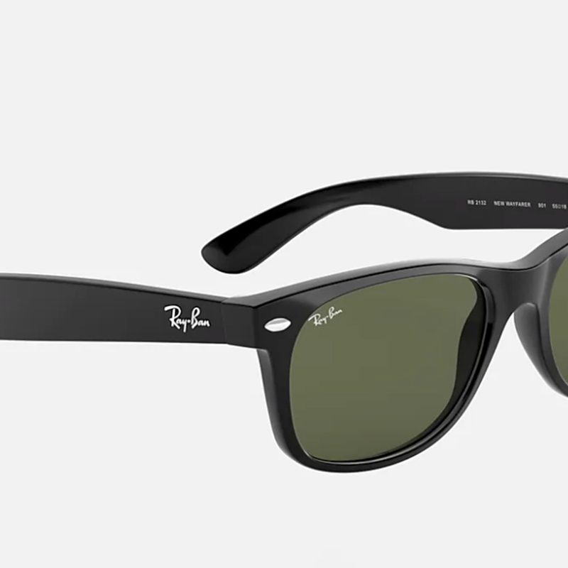 Black sunglasses on a plain background.