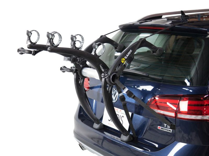 Saris Bones EX 3-Bike Trunk Rack mounted on a vehicle against a plain white studio background.