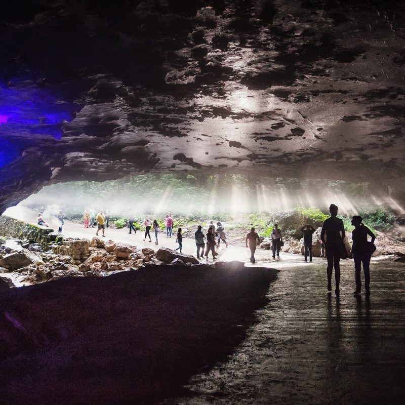 Groups of people standing at The Caverns.