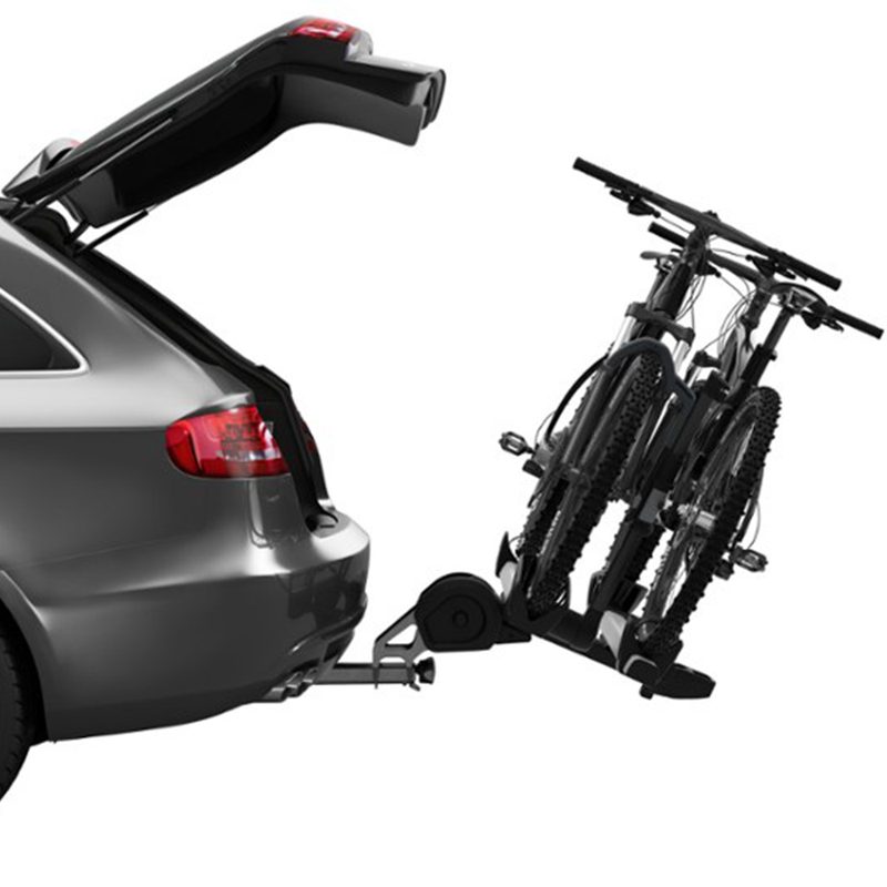 Thule T2 Pro XT 2-Bike Hitch Rack mounted on a vehicle against on a plain studio background.