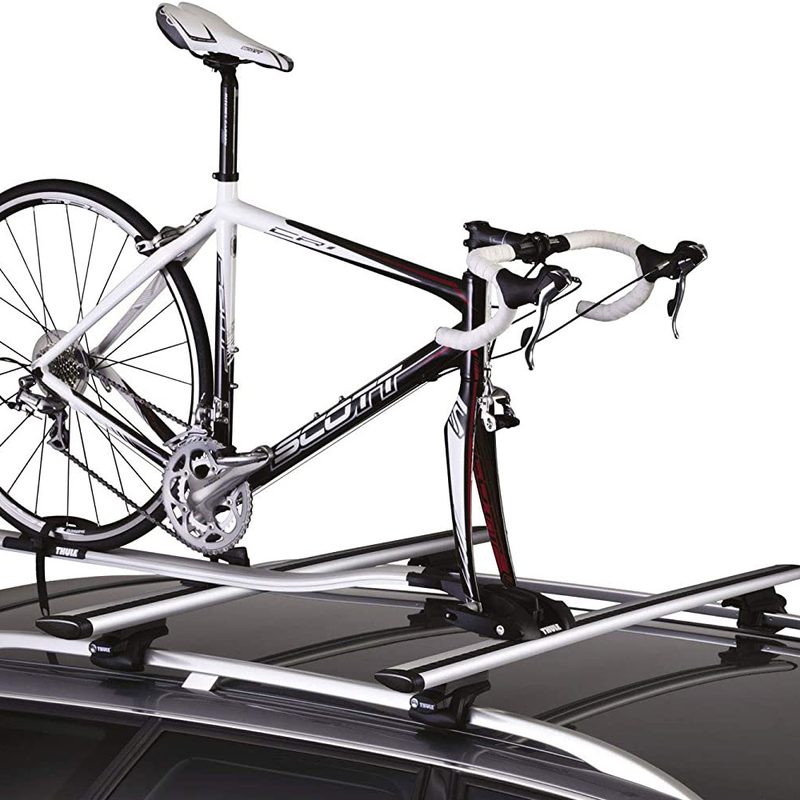 Thule OutRide Roof Bike Rack mounted on top of a vehicle on a plain white background.