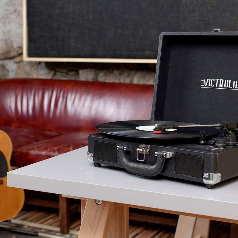 Victrola record player on a table.