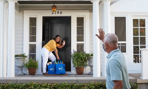 Walmart Plus delivery on doorstep lifestyle image.