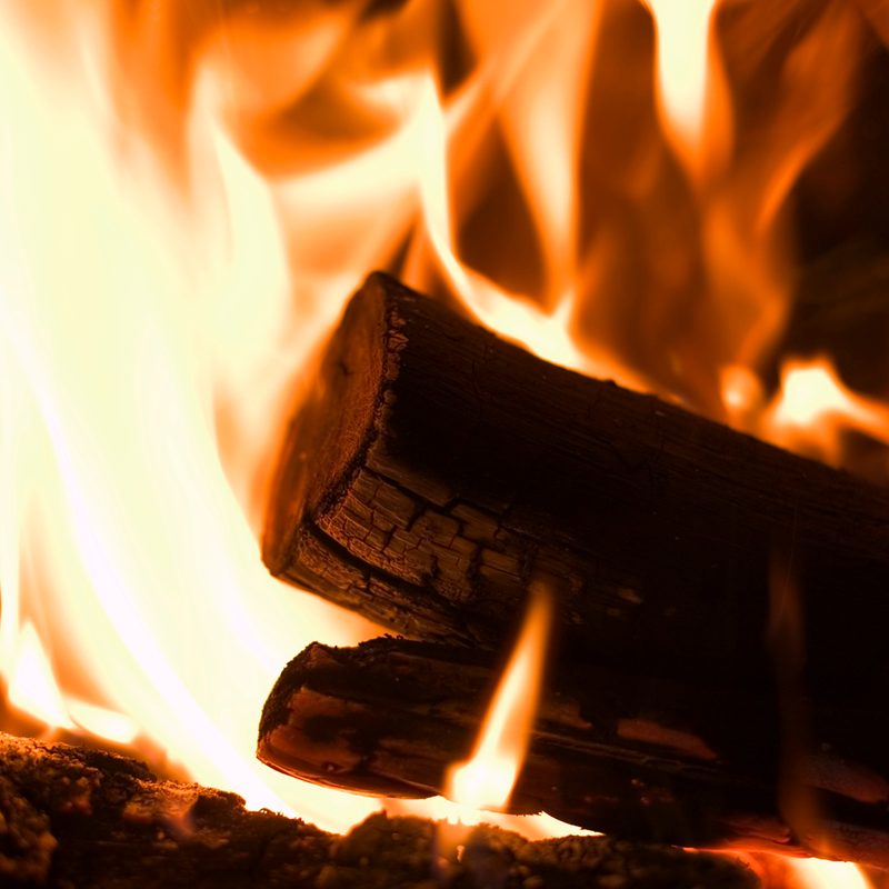 Logs engulfed in fire