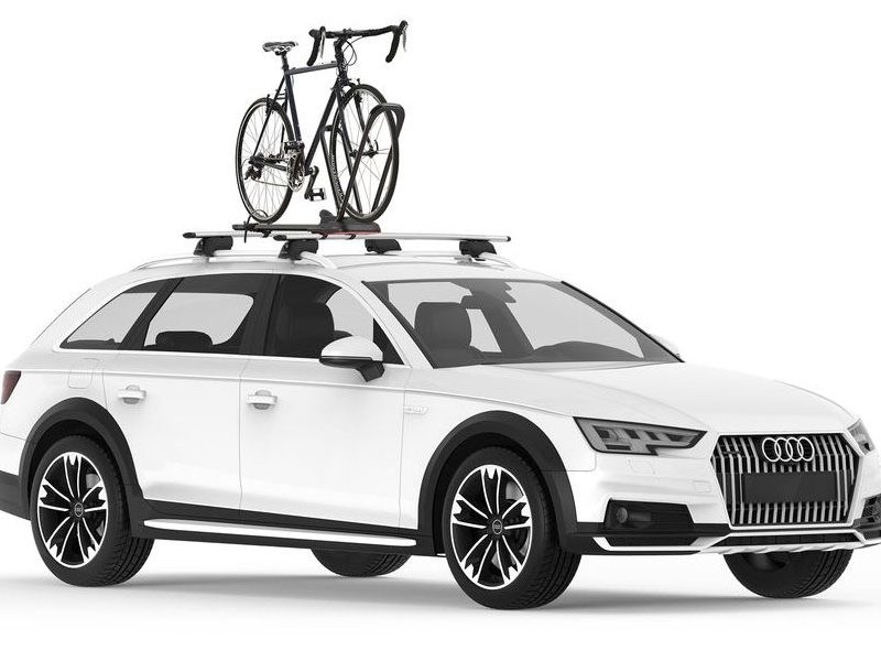 Yakima HighRoad roof-mounted bike rack on top of an Audi SUV.