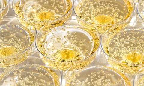Glasses with bubbling Champagne