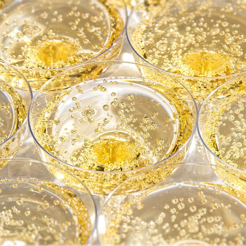 Glasses with bubbling Champagne