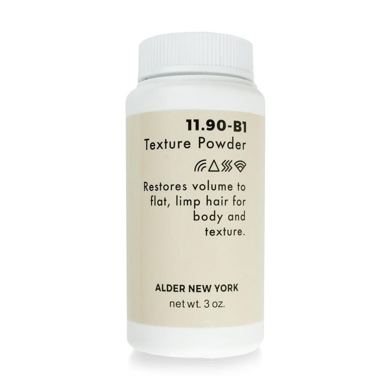 A capsule bottle of Adler New York Natural Hair Powder on a white background.