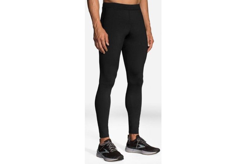 Brooks Source Tights and black sneakers.