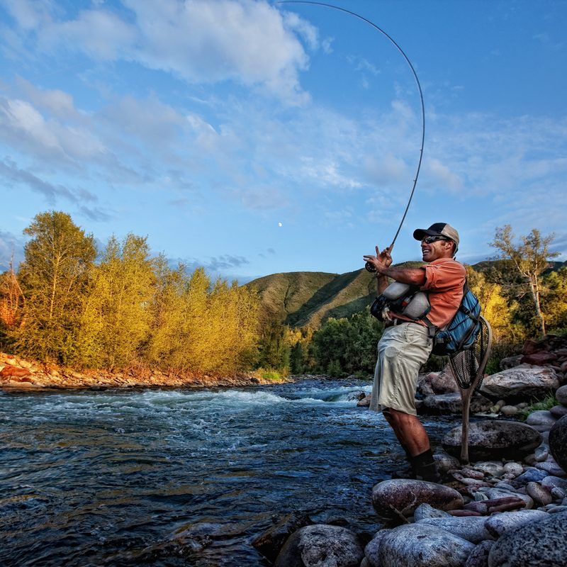 An angler reeling in a catch in Glenwood Springs, Colorado.