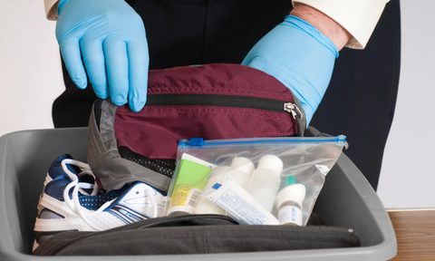 TSA going through toiletries