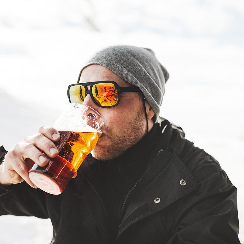 Drinking a beer at after skiing