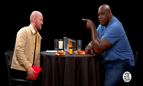 Sean Evans and Shaq in Hot Ones Interview 2021