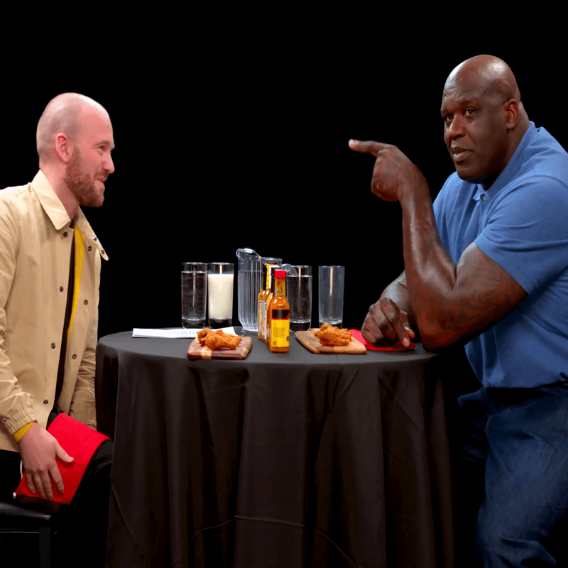Sean Evans and Shaq in Hot Ones Interview 2021