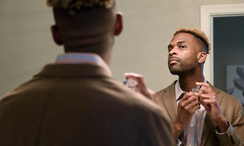 Man applying aftershave