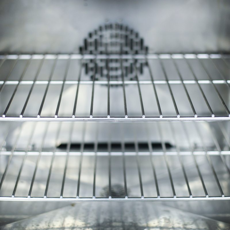 Inside of a modern empty oven