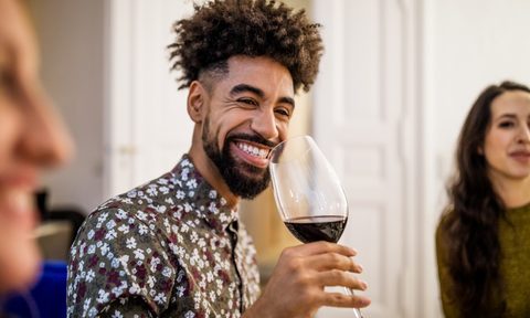how to hold a wine glass