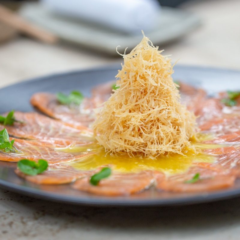 Plate of thin sliced tuna at Osaka in Miami