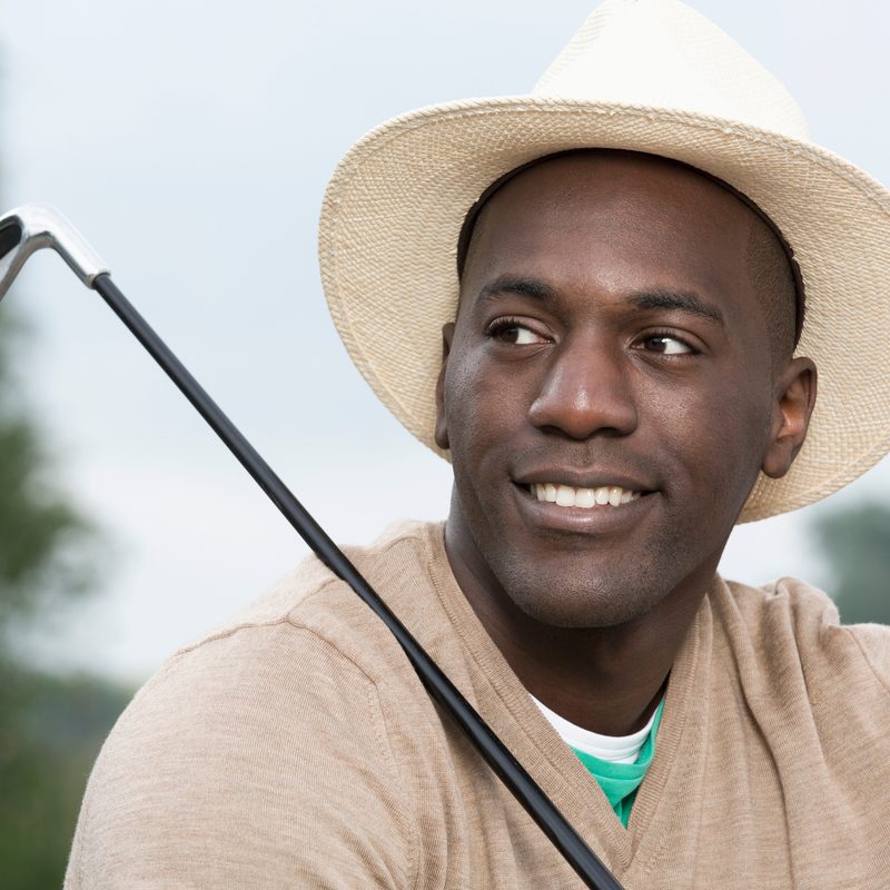 Man relaxing at the golf course