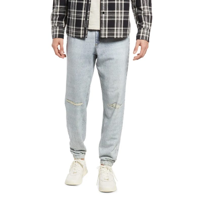 Rag & Bone Miramar Jogger- Sonora partnered with a flannel shirt, an undershirt, and white sneakers.