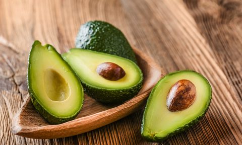 Fresh avocadoes in half