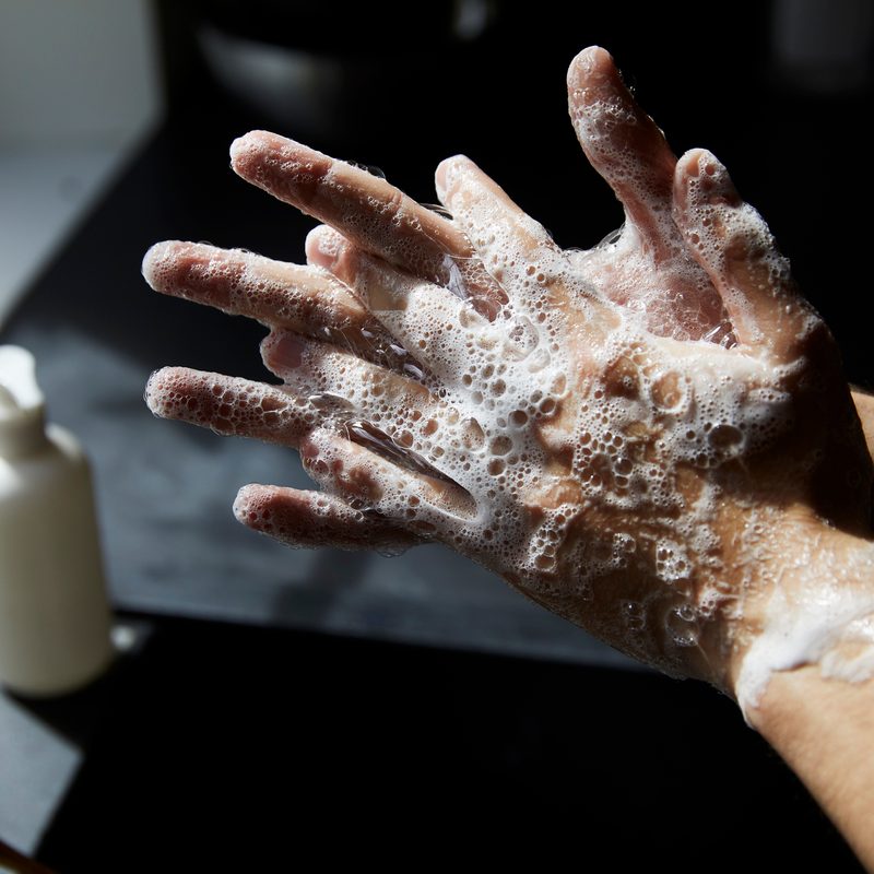 man washing hands