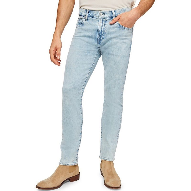 7 For All Mankind Paxtyn Skinny Fit Jeans paired with peach shirt and a pair of dress shoes.
