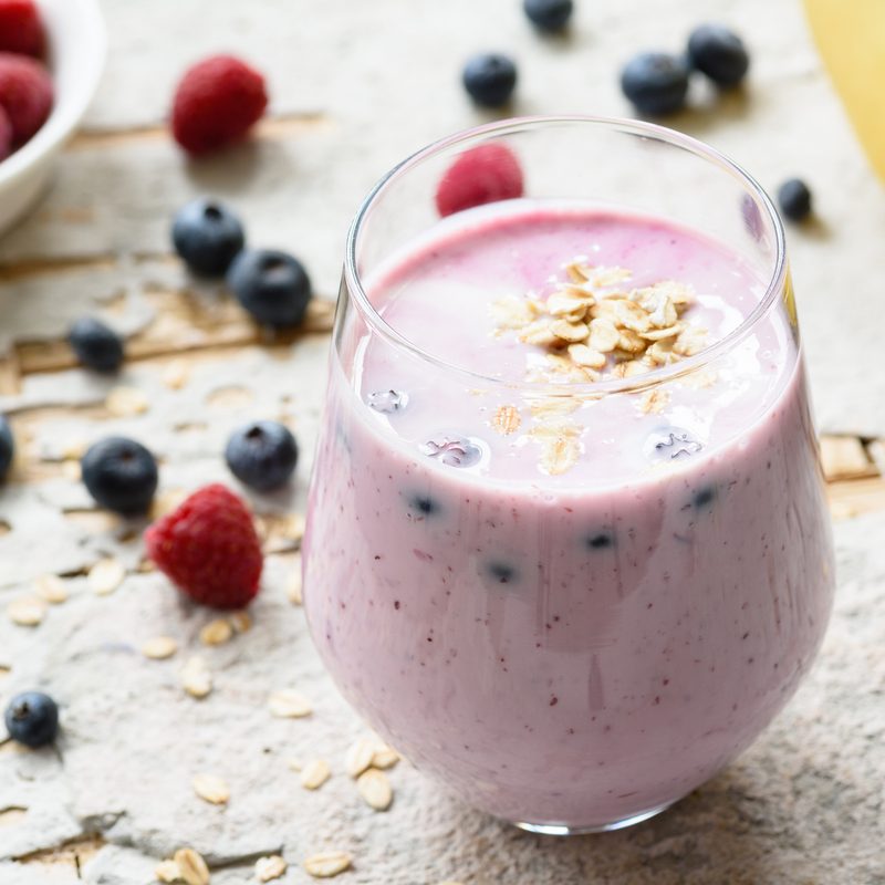 Healthy breakfast smoothie with berries and oats
