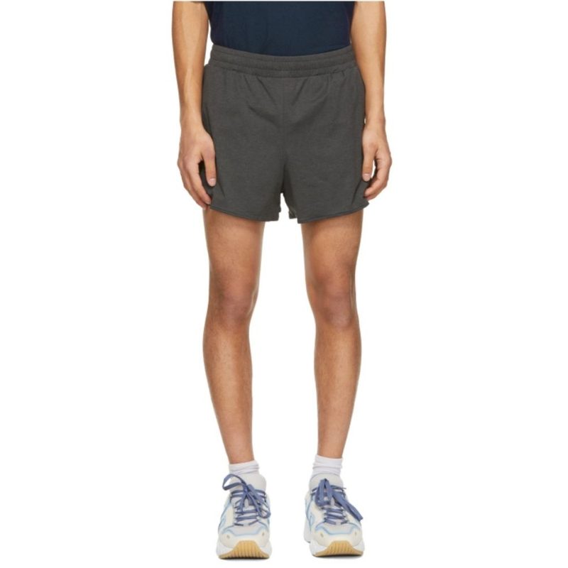 Acne Running Shorts worn by a figure on a white background.