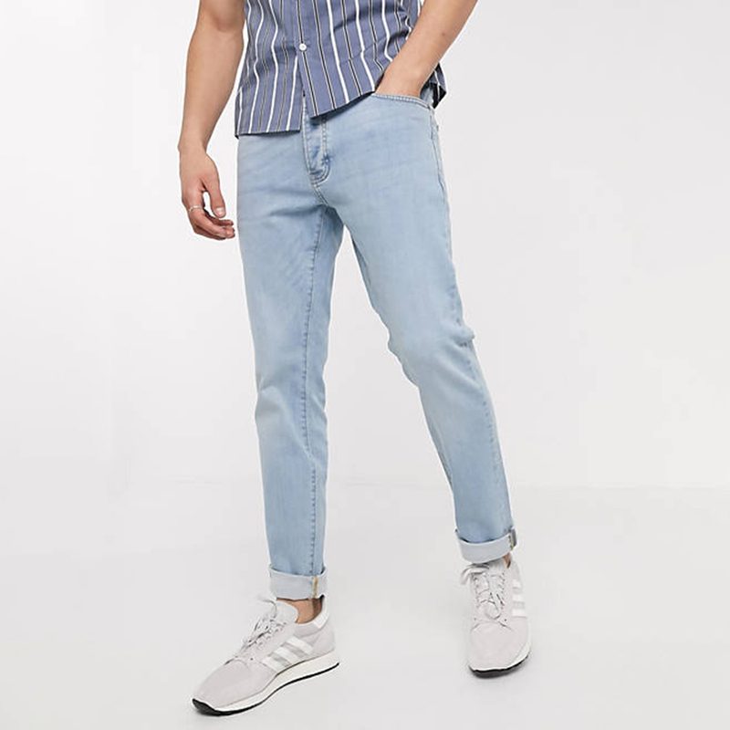 Topman Organic Cotton Slim Jeans paired with casual polo and white sneakers.