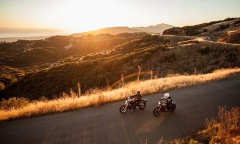 best motorcycle gifts for dads two friends riding motorcycles together on country roads  santa barbara county california usa