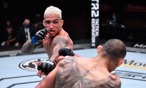 Charles Oliveira fighting Tony Ferguson at UFC 256.