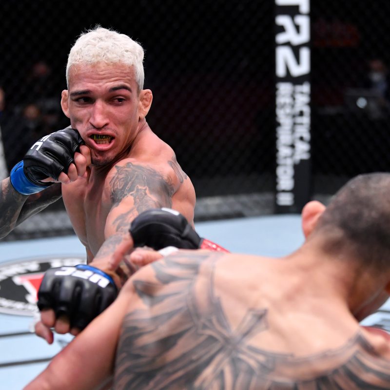 Charles Oliveira fighting Tony Ferguson at UFC 256.