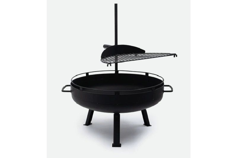 Barebones Cowboy Firepit 23-Inch on a gray background.